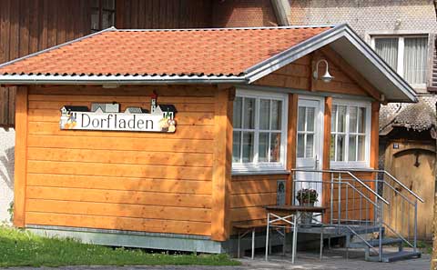 2011 - Der Dorfladen ist in Scheffau neben dem Maibaum, bitte klicken!